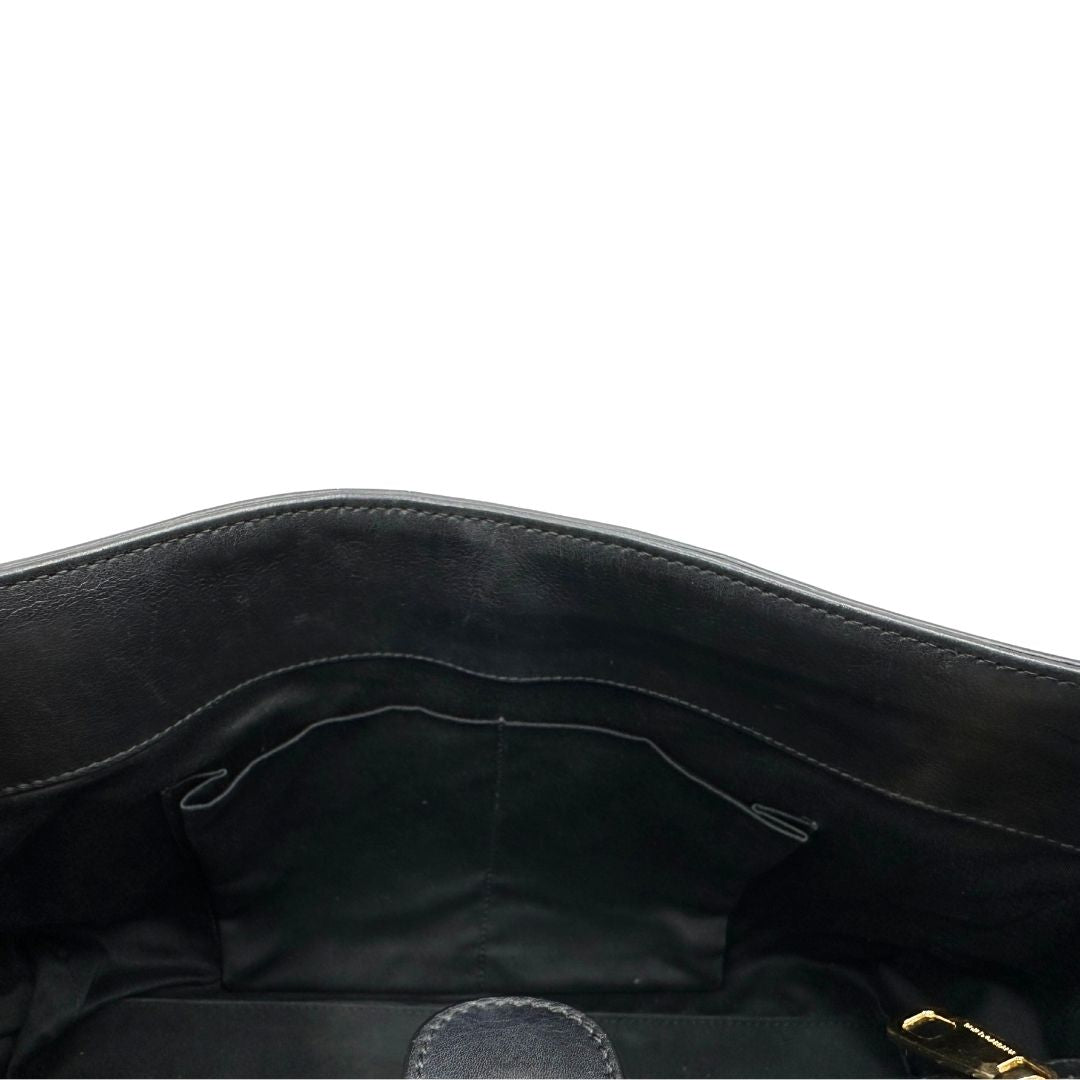 interno Borsa Dolce & Gabbana in canvas con trama animalier, finiture nere e parti metalliche dorate; munita di un manico singolo e un manico amovibile, di lusso, originale, ottime condizioni. 