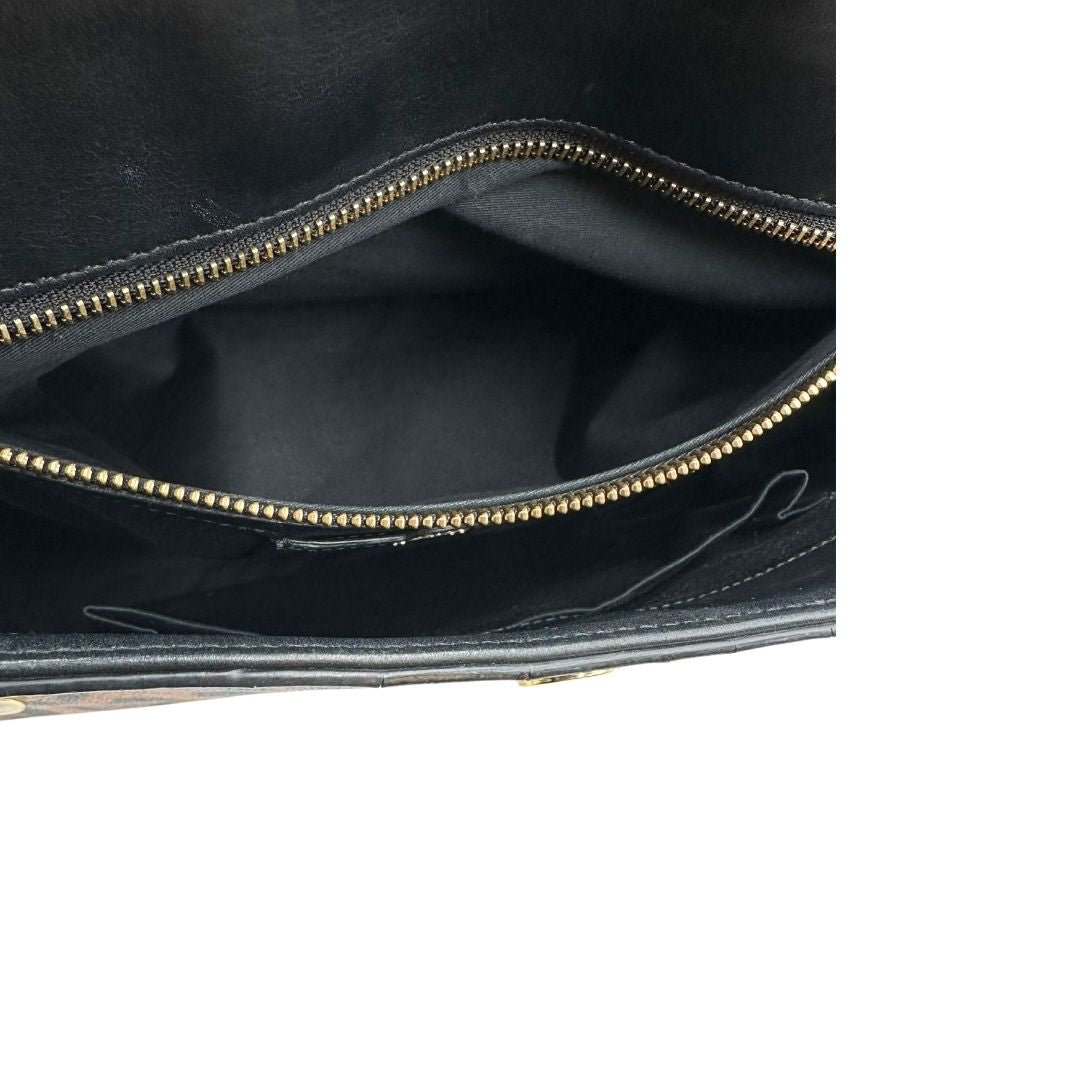 interno Borsa Dolce & Gabbana in canvas con trama animalier, finiture nere e parti metalliche dorate; munita di un manico singolo e un manico amovibile, di lusso, originale, ottime condizioni. 