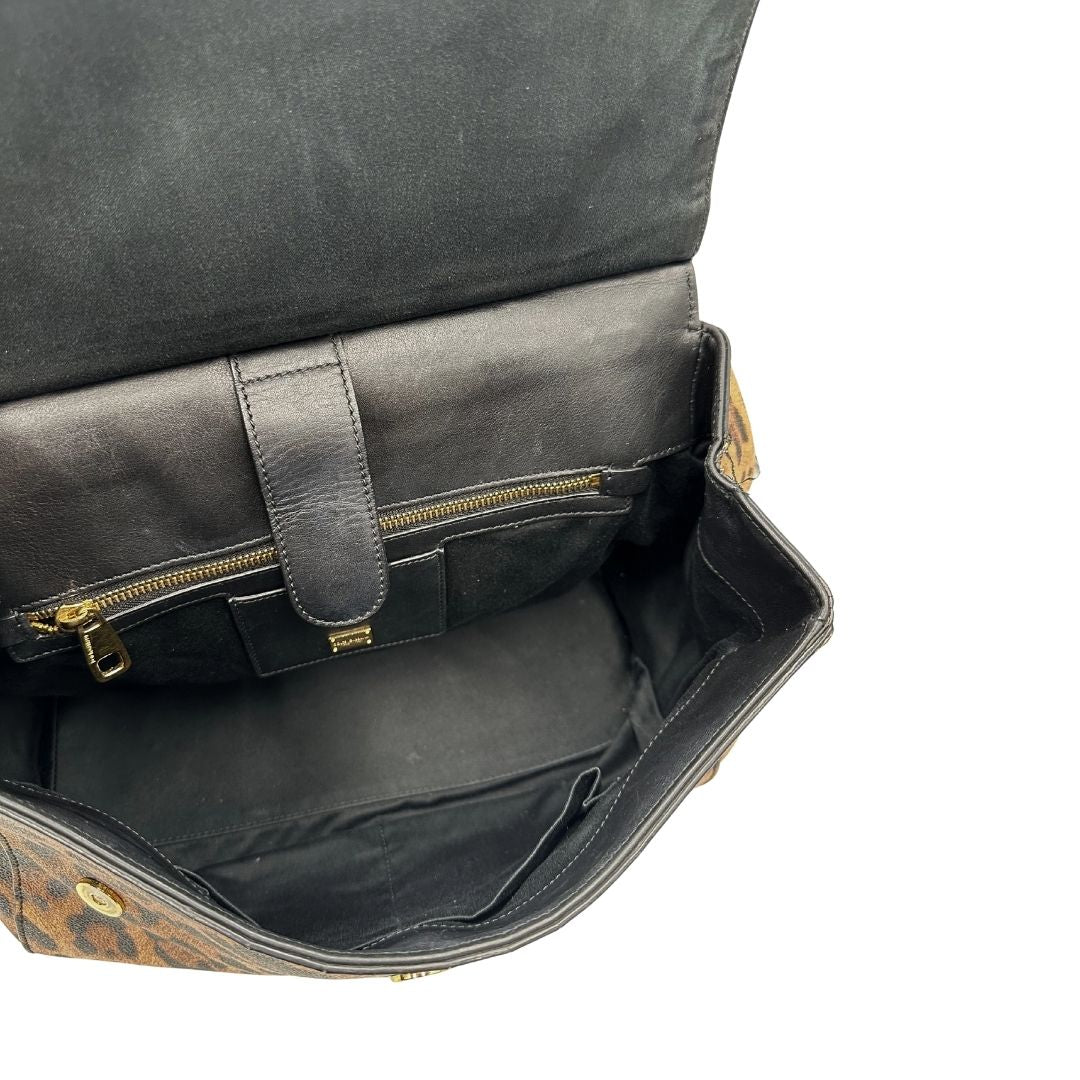 interno Borsa Dolce & Gabbana in canvas con trama animalier, finiture nere e parti metalliche dorate; munita di un manico singolo e un manico amovibile, di lusso, originale, ottime condizioni. 