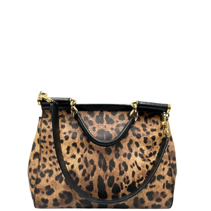 retro Borsa Dolce & Gabbana in canvas con trama animalier, finiture nere e parti metalliche dorate; munita di un manico singolo e un manico amovibile, di lusso, originale, ottime condizioni. 