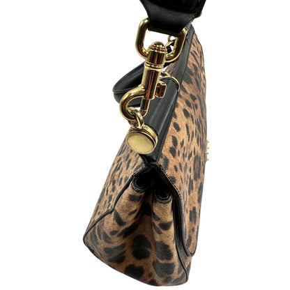 lato Borsa Dolce & Gabbana in canvas con trama animalier, finiture nere e parti metalliche dorate; munita di un manico singolo e un manico amovibile, di lusso, originale, ottime condizioni. 