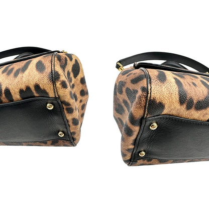 angoli Borsa Dolce & Gabbana in canvas con trama animalier, finiture nere e parti metalliche dorate; munita di un manico singolo e un manico amovibile, di lusso, originale, ottime condizioni. 
