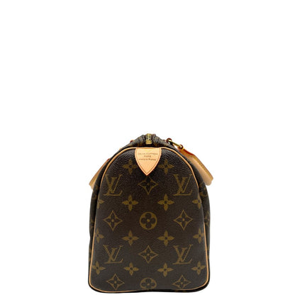Laterale di una borsa Louis Vuitton in canvas monogrammato con parti metalliche dorate; munita di doppi manici stondati, da portare a mano. Completo di scatola, dustbag, lucchetto e chiavi.