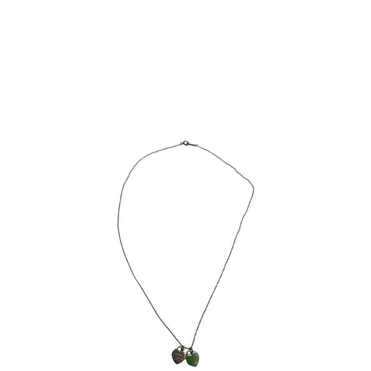 Collana Tiffany&Co. della collezione Return To Tiffany in argento 925 con doppio ciondolo cuore. Completa di scatola e sacchetto.