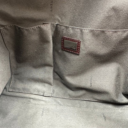 interno Borsa Fendi in canvas color tabacco trama Zucca camouflage; munita di doppi manici stondati, da portare a spalla. Completa di dustbag, di lusso, originale, ottime condizioni, usata. 