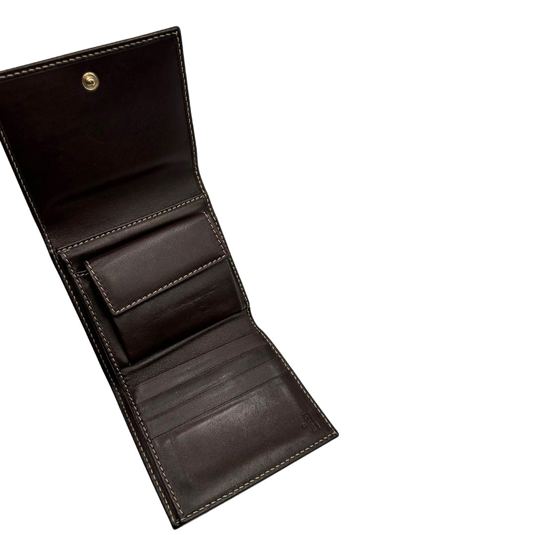 interno Portafoglio Gucci in tessuto beige GG con finiture in pelle marrone e parti metalliche dorate. Completo di busta e dustbag, di lusso, originale, ottime condizioni.  