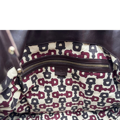 interno Borsa Gucci in pelle marrone GG con parti metalliche dorate; munita di un manico rigido, impreziosita da doppia nappa con dettaglio bamboo e angoli finiture metalliche, di lusso, originale, ottime condizioni 