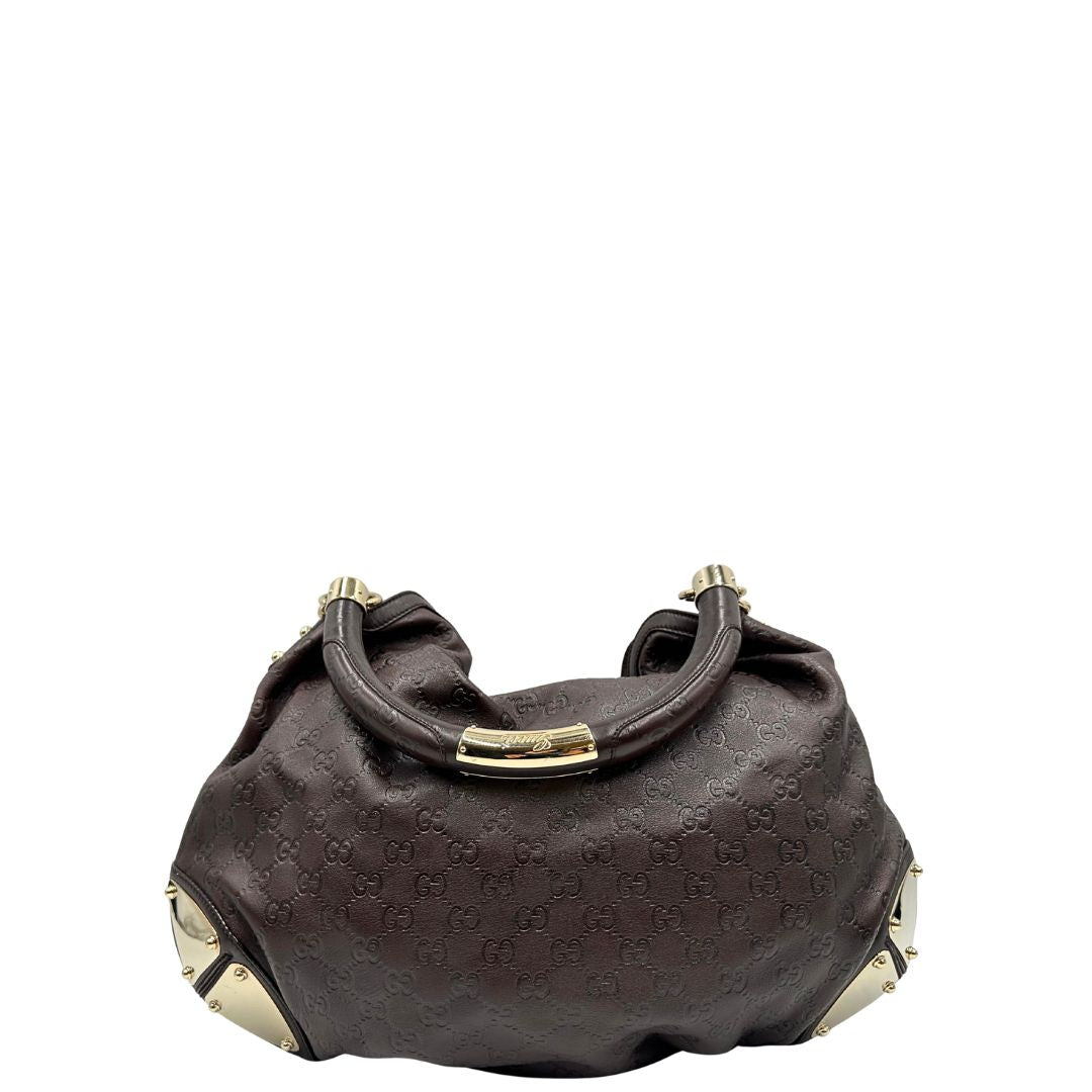 retro Borsa Gucci in pelle marrone GG con parti metalliche dorate; munita di un manico rigido, impreziosita da doppia nappa con dettaglio bamboo e angoli finiture metalliche, di lusso, originale, ottime condizioni