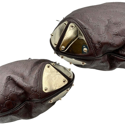 angoli Borsa Gucci in pelle marrone GG con parti metalliche dorate; munita di un manico rigido, impreziosita da doppia nappa con dettaglio bamboo e angoli finiture metalliche, di lusso, originale, ottime condizioni 