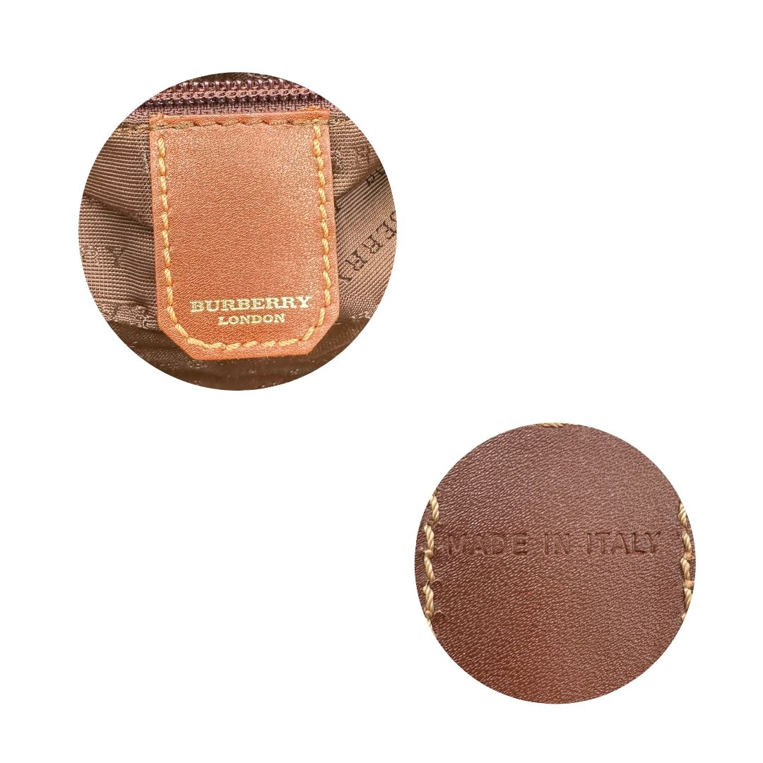 Borsone Burberry in canvas trama tartan con finiture in pelle marroni e parti metalliche dorate; munito di doppi manici stondati e una tracolla amovibile. Completo di lucchetto e chiavi, di lusso, originale, ottime condizioni.