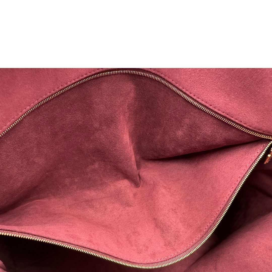 interno Borsa L.V. in canvas marrone monogram con finiture in vacchetta naturale e parti metalliche dorate; munita di un manico singolo stondato e intrecciato, indossabile a spalla. Completa di corredo, di lusso, originale, ottime condizioni.