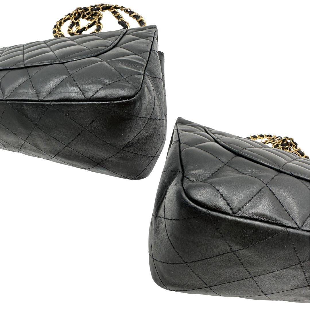 angoli Iconica Chanel Timeless Classique in pelle matelassé nera con tracolla scorrevole in catena e pelle intrecciate, con parti metalliche dorate. Completa di scatola e dustbag. Indossabile a spalla o a tracolla, di lusso, originale, ottime condizioni.