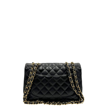 retro Iconica Chanel Timeless Classique in pelle matelassé nera con tracolla scorrevole in catena e pelle intrecciate, con parti metalliche dorate. Completa di scatola e dustbag. Indossabile a spalla o a tracolla, di lusso, originale, ottime condizioni. 