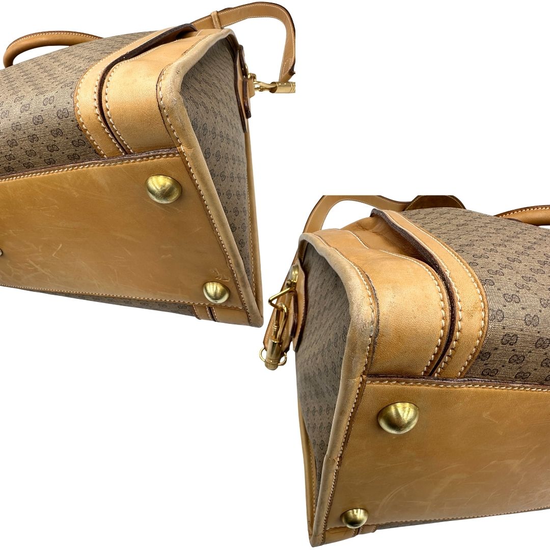 Angoli di una borsa Gucci in canvas beige GG con finiture in pelle color cammello e parti metalliche dorate, munita di doppi manici stondati e di una tracolla amovibile e regolabile. Dotata di tag porta address.