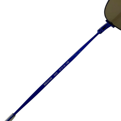 Occhiali da sole Balenciaga in metallo blu e lenti cat eye tono su tono. Completi di scatola.