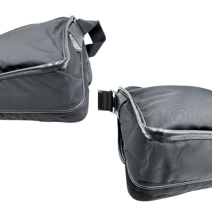 Angoli di una Borsa Prada in nylon nero con finiture in pelle tono su tono e parti metalliche argentate; munita di una tracolla regolabile in tessuto. Originale, usata, di lusso, in ottime condizioni.