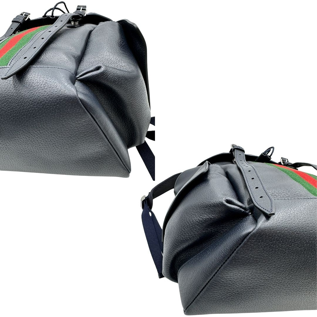 Angoli di uno zaino Gucci in canvas pelle blu notte, con parti metalliche argentate. Iconica striscia Web in verde/rosso sul front, con cinghie regolabili e tasche laterali. Completo di dustbag.