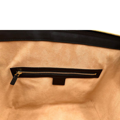 interno Borsa Gucci in pelle scamosciata nera con finiture in pelle tono su tono e parti metalliche dorate; munita di doppi manici e una tracolla amovibile e regolabile. Completa di dustbag, di lusso, originale, ottime condizioni, usato. 