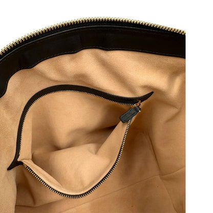 interno Borsa Gucci in pelle scamosciata nera con finiture in pelle tono su tono e parti metalliche dorate; munita di doppi manici e una tracolla amovibile e regolabile. Completa di dustbag, di lusso, originale, ottime condizioni, usato. 