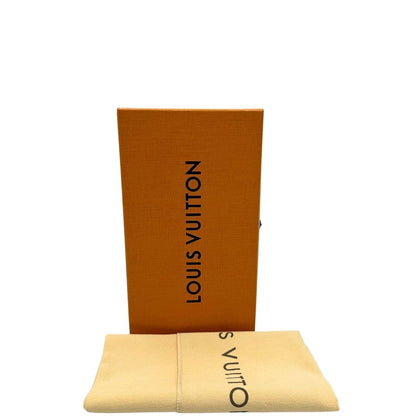 Portafoglio Louis Vuitton Sarah Retiro in canvas monogrammato marrone e finiture rosse, completo di corredo.