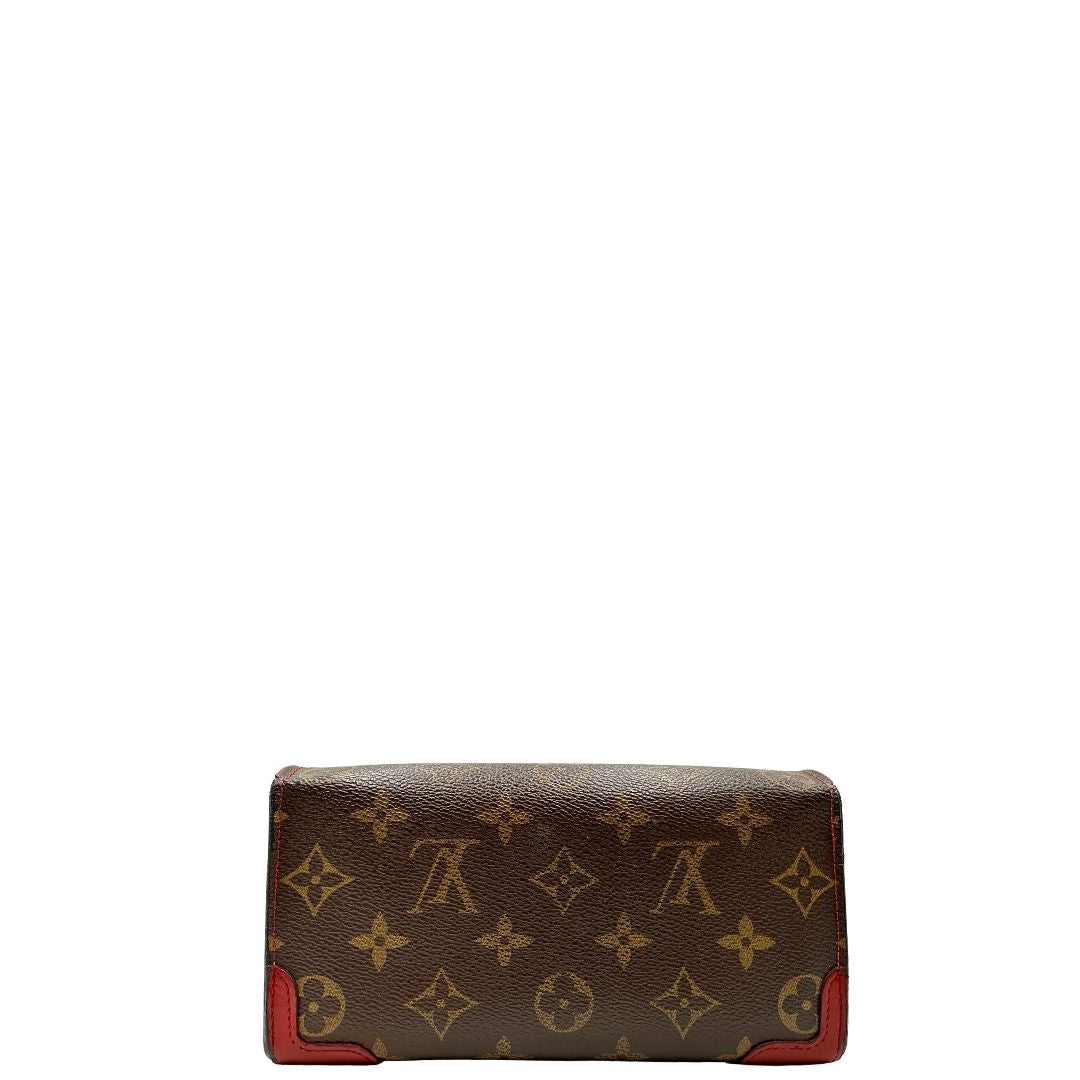 Portafoglio Louis Vuitton Sarah Retiro in canvas monogrammato marrone e finiture rosse, completo di corredo.