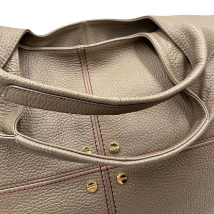 manici Borsa Borbonese in pelle martellata grigia con parti metalliche dorate e cuciture rosse; munita di doppi manici. Completa di dustbag e cartellini, di lusso, originale,usata. 