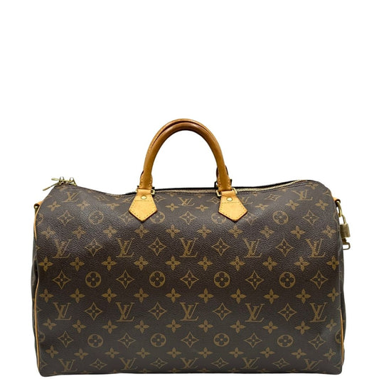 front Borsa Louis Vuitton in canvas marrone monogram con finiture in vacchetta naturale e parti metalliche dorate; munita di doppi manici stondati. Completa di lucchetto e chiavi, di lusso, originale, ottime condizioni, usato. 