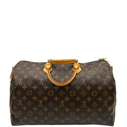 retro Borsa Louis Vuitton in canvas marrone monogram con finiture in vacchetta naturale e parti metalliche dorate; munita di doppi manici stondati. Completa di lucchetto e chiavi, di lusso, originale, ottime condizioni, usato. 