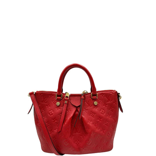front Borsa Louis Vuitton in pelle rossa monogram con parti metalliche dorate; munita di doppi manici stondati e una tracolla amovibile. Completa di scatola, di lusso, originale, ottime condizioni, usata. 