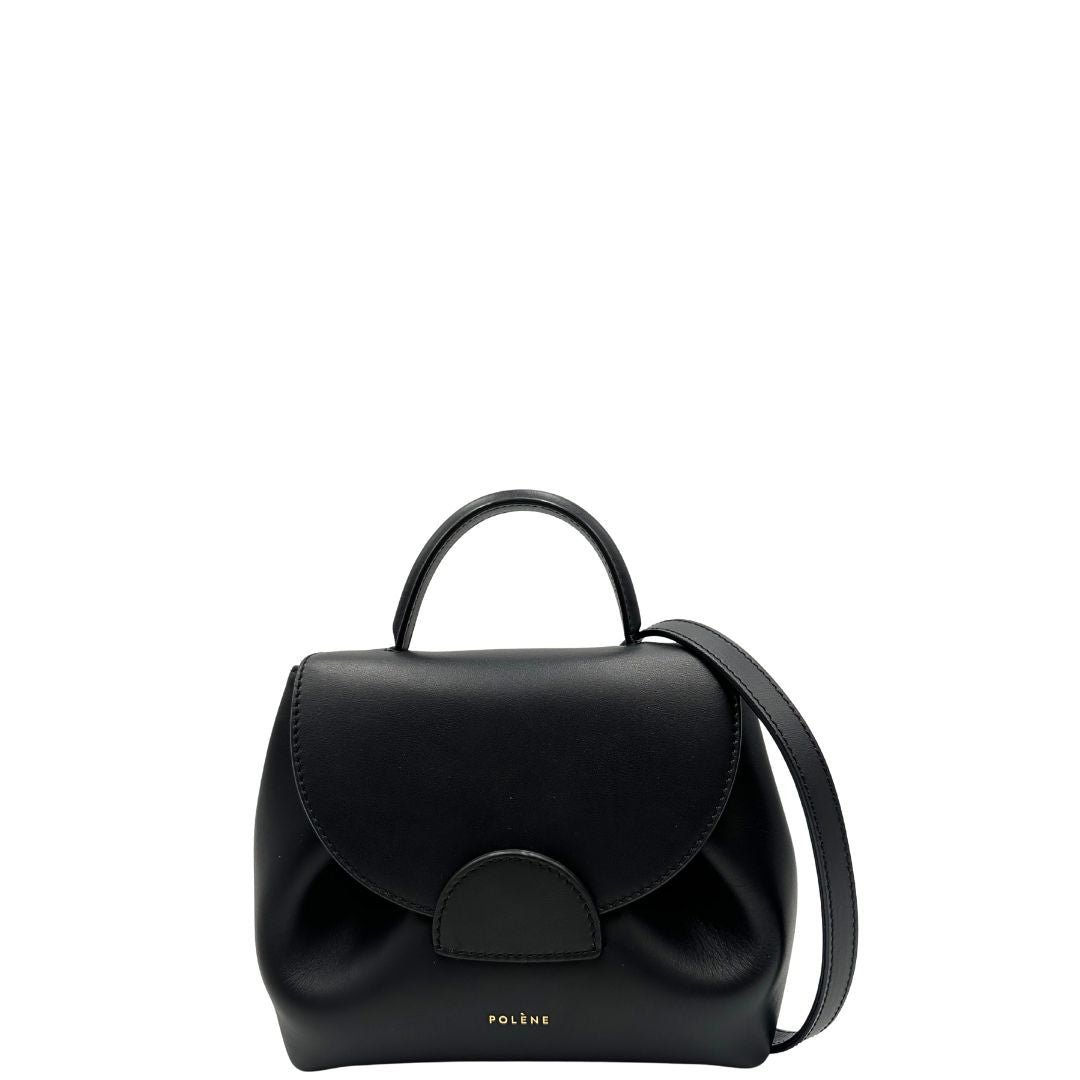 front  Borsa Polène in pelle nera con parti metalliche dorate; munita di un manico singolo stondato e una tracolla regolabile. Full set, di lusso, originale, ottime condizioni, usata.  