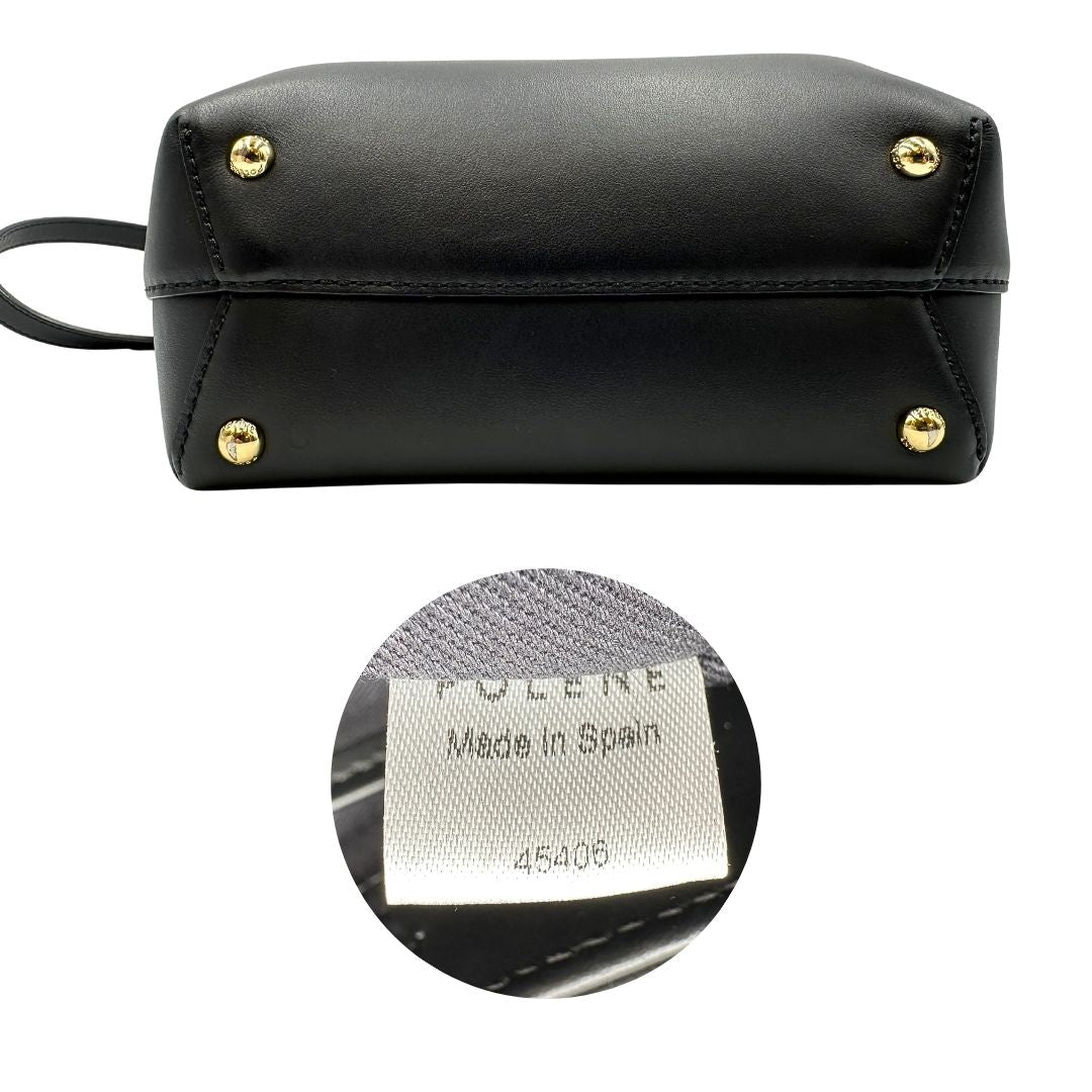 interni  Borsa Polène in pelle nera con parti metalliche dorate; munita di un manico singolo stondato e una tracolla regolabile. Full set, di lusso, originale, ottime condizioni, usata.  