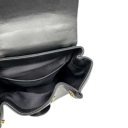 interni  Borsa Polène in pelle nera con parti metalliche dorate; munita di un manico singolo stondato e una tracolla regolabile. Full set, di lusso, originale, ottime condizioni, usata.  