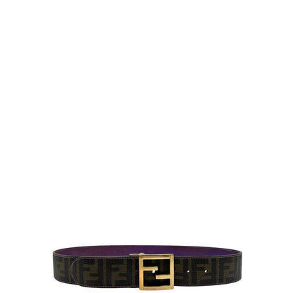 Cintura Fendi reversibile in canvas color tabacco con trama zucca e in pelle viola. Originale, usata, di lusso, in ottime condizioni.
