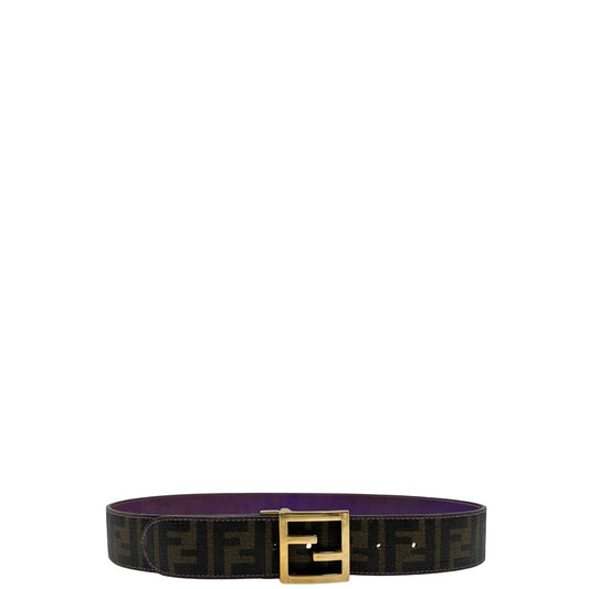 Cintura Fendi reversibile in canvas color tabacco con trama zucca e in pelle viola. Originale, usata, di lusso, in ottime condizioni.