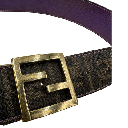 Cintura Fendi reversibile in canvas color tabacco con trama zucca e in pelle viola. Originale, usata, di lusso, in ottime condizioni.