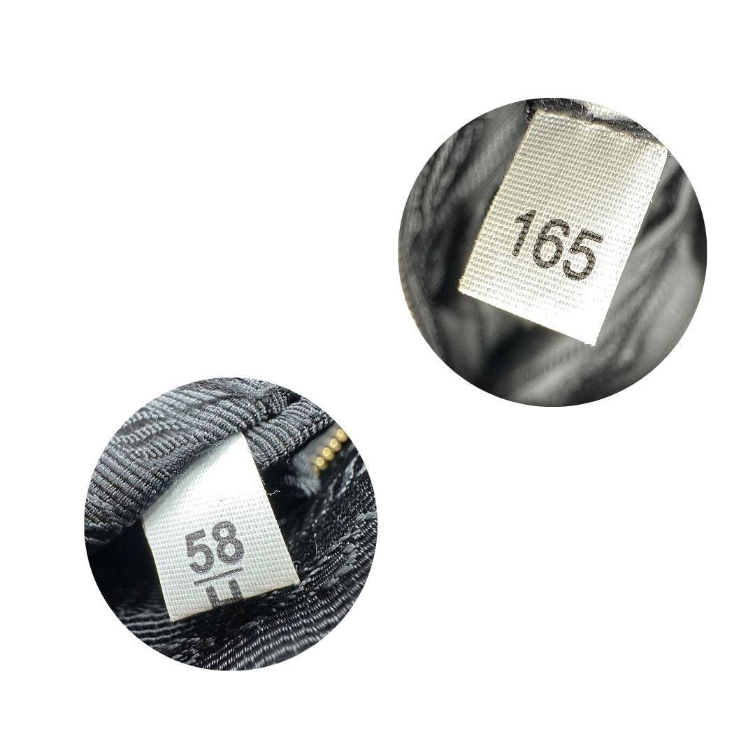 codici Borsa Prada in nylon nero con finiture in pelle tono su tono e parti metalliche dorate; munita di una tracolla regolabile in tessuto. Completa di dustbag, di lusso, originale, ottime condizioni, usata. 