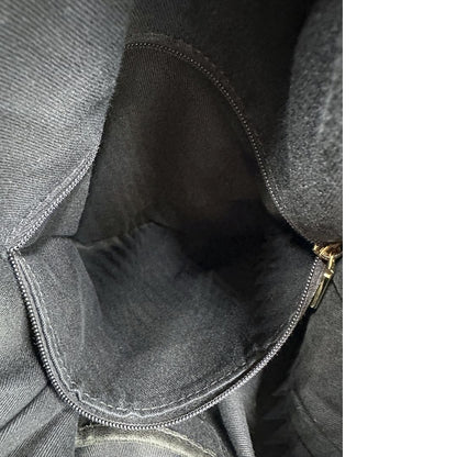 interno  Borsa Dolce & Gabbana in rafia e pelle nera, dalla struttura morbida e capiente, di lusso, originale, ottime condizioni, usata. 