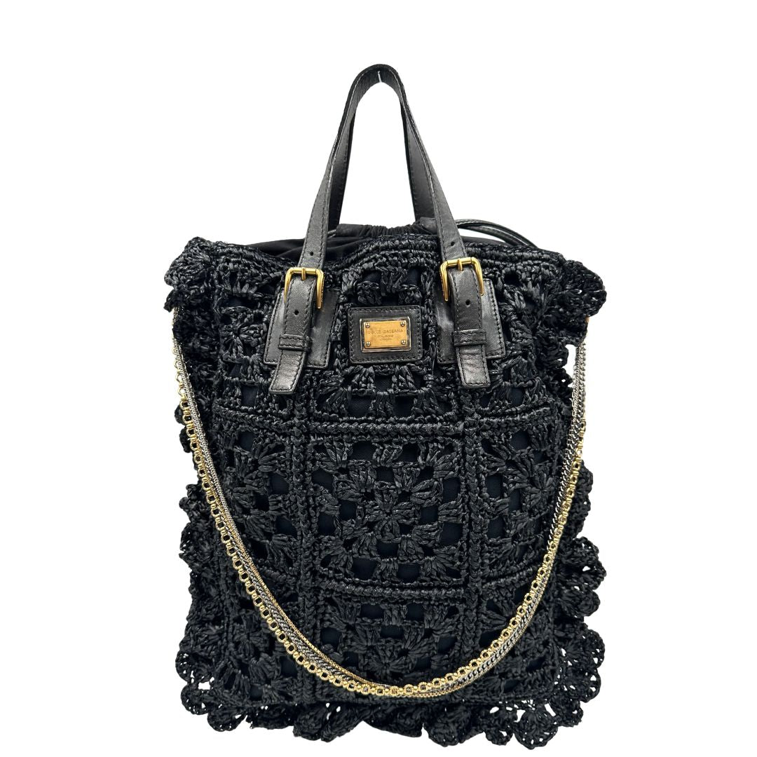 front  Borsa Dolce & Gabbana in rafia e pelle nera, dalla struttura morbida e capiente, di lusso, originale, ottime condizioni, usata. 