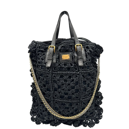 front  Borsa Dolce & Gabbana in rafia e pelle nera, dalla struttura morbida e capiente, di lusso, originale, ottime condizioni, usata. 