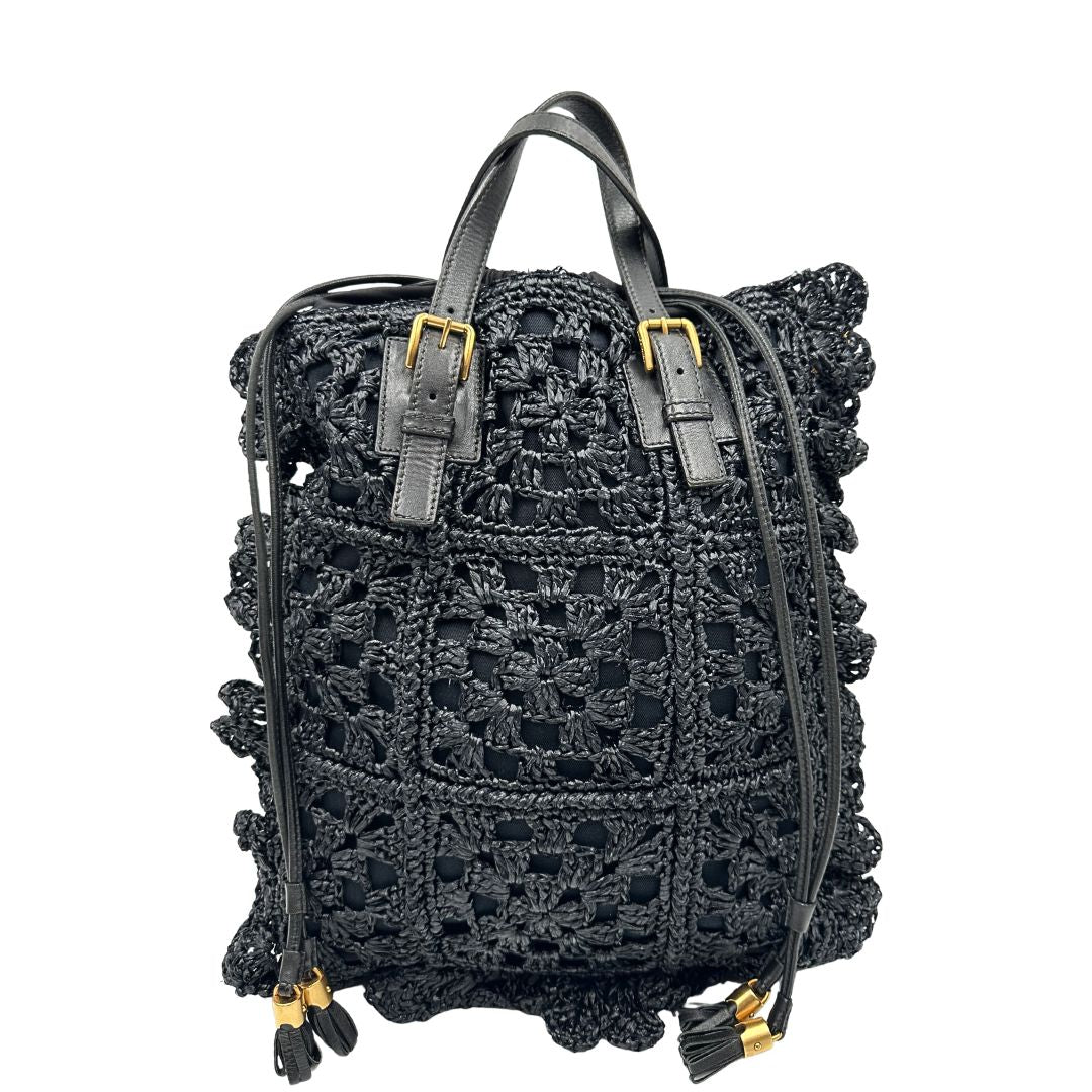 retro  Borsa Dolce & Gabbana in rafia e pelle nera, dalla struttura morbida e capiente, di lusso, originale, ottime condizioni, usata. 