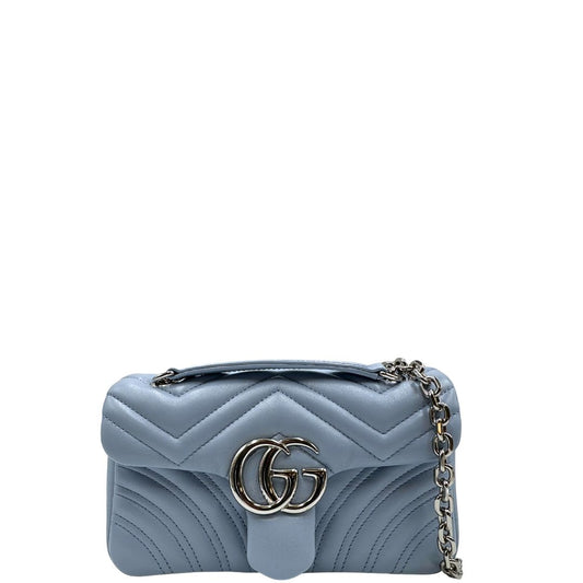 front  Borsa Gucci in pelle matelassè azzurra con parti metalliche argentate; munita di una tracolla in catena scorrevole con spallacci in pelle. Completa di dustbag, di lusso, eccellenti condizioni, usata, originale.  