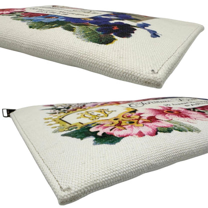 Angoli di una pochette Dior in tela bianco latte con stampa motivo floreale multicolore e parti metalliche argentate. Munita di dustbag.