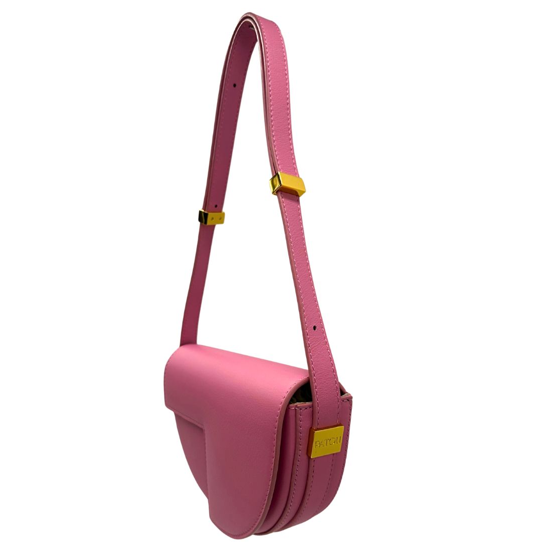 lato Borsa Patou in pelle rosa con parti metalliche dorate; munita di una tracolla regolabile. Completa di dustbag, di lusso, eccellenti condizioni, usata. 