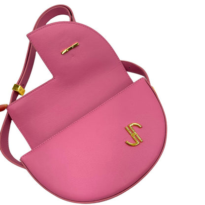interno Borsa Patou in pelle rosa con parti metalliche dorate; munita di una tracolla regolabile. Completa di dustbag, di lusso, eccellenti condizioni, usata. 