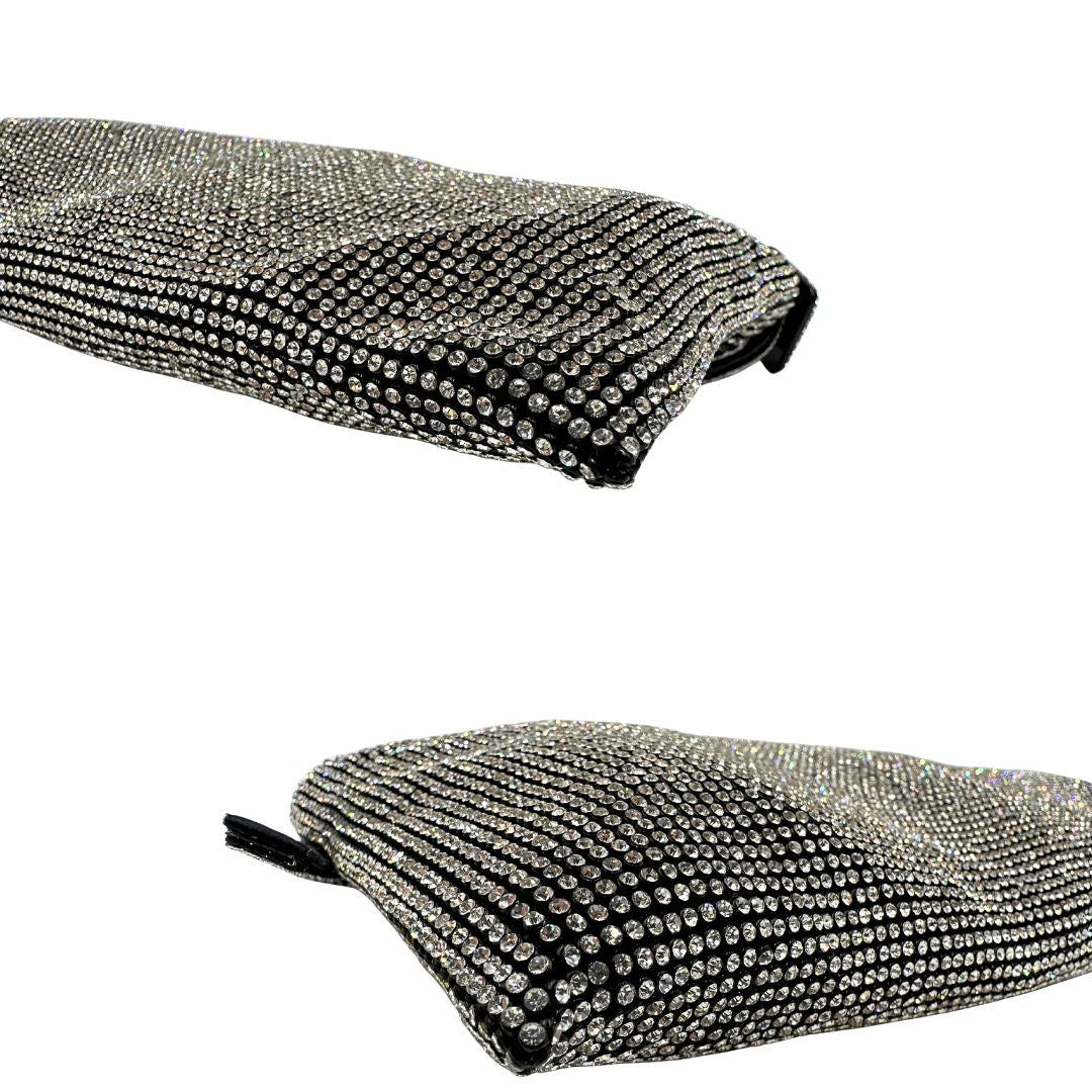 Angoli di una borsa Benedetta Bruzziches in tessuto ricoperto da strass multicolore; munita di un manico singolo con fibbie laterali, indossabile a spalla. Completa di dustbag e scatola.