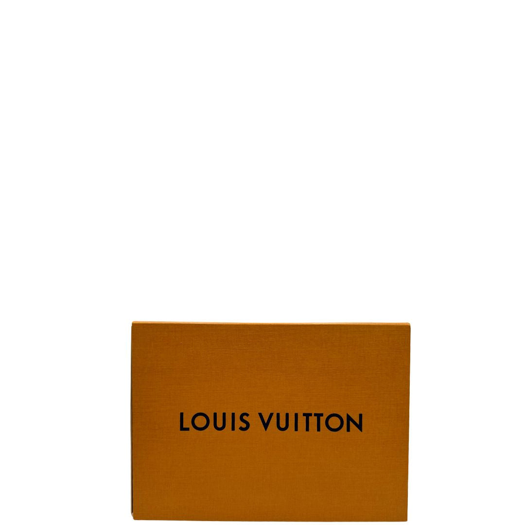 Scatola di una borsa Louis Vuitton in pelle blu notte Monogram Empreinte, con parti metalliche dorate; munita di una tracolla scorrevole con spallacci in pelle. 