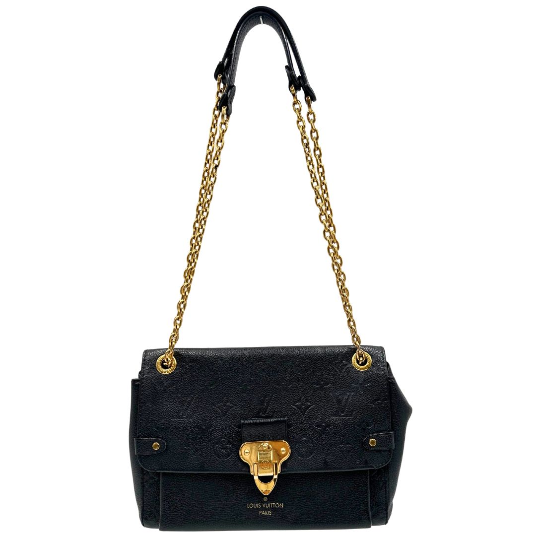 Front di una borsa Louis Vuitton in pelle blu notte Monogram Empreinte, con parti metalliche dorate; munita di una tracolla scorrevole con spallacci in pelle. Completa di scatola.