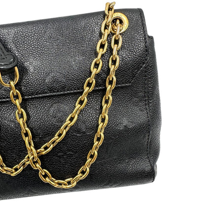 Catene di una borsa Louis Vuitton in pelle blu notte Monogram Empreinte, con parti metalliche dorate; munita di una tracolla scorrevole con spallacci in pelle. Completa di scatola.