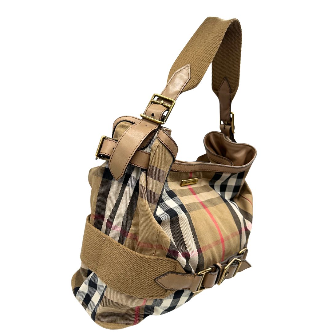 lato  Borsa Burberry in tessuto tartan beige con parti metalliche dorate; munita di un manico singolo, indossabile a spalla, di lusso, originale, ottime condizioni, usata. 