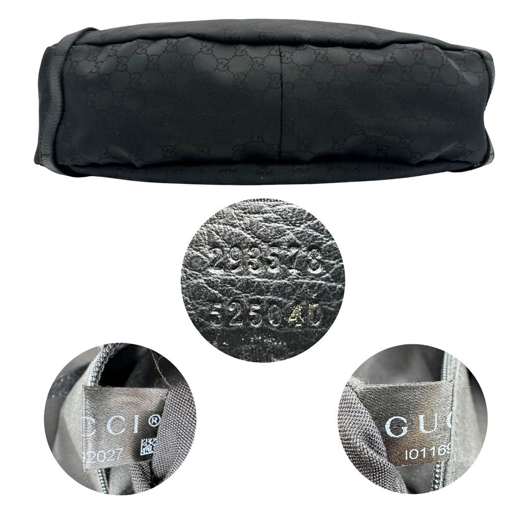 Base e codici di una borsa Gucci in tessuto nero GG con finiture in pelle tono su tono e parti metalliche argentate; munita di doppi manici, indossabile a spalla. Completa di dustbag.